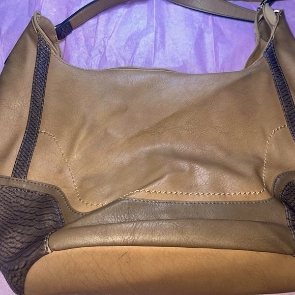 This is a brown-tan Louis Candy purse in healthy condition - Picture 1 of 5